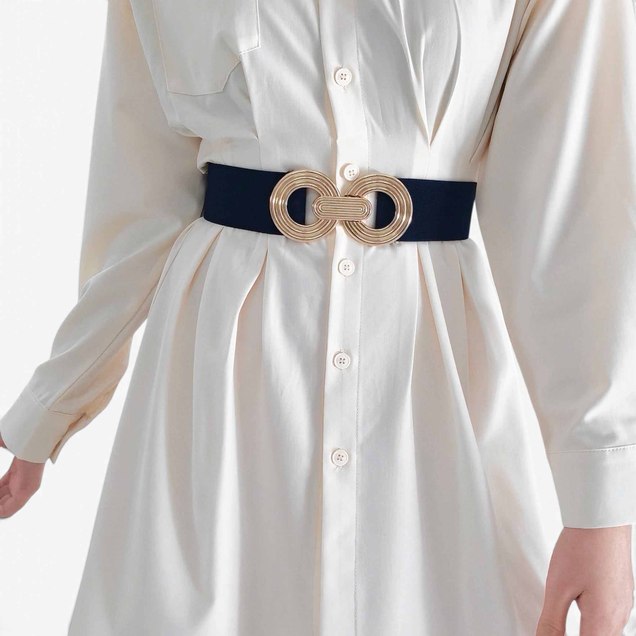 Beach Rose Co. wide black elastic waist belt featuring a gold double-circle alloy buckle worn over a white shirt dress