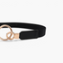 Beach Rose Co. slim black elastic waist belt featuring an asymmetric gold double-ring buckle and stitched PU tabs.