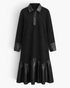 Beach Rose Co. black midi dress featuring a knit body, faux leather collar, cuffs, and a gathered hem with buttons.