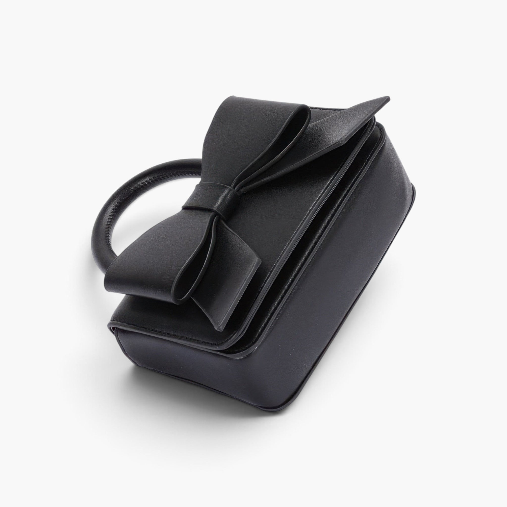 Beach Rose Co. black faux leather handbag featuring a structured silhouette and a decorative ribbon top handle.