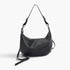 Beach Rose Co. black vegan leather shoulder bag with a unique faux strap design and mixed metal hardware accents.