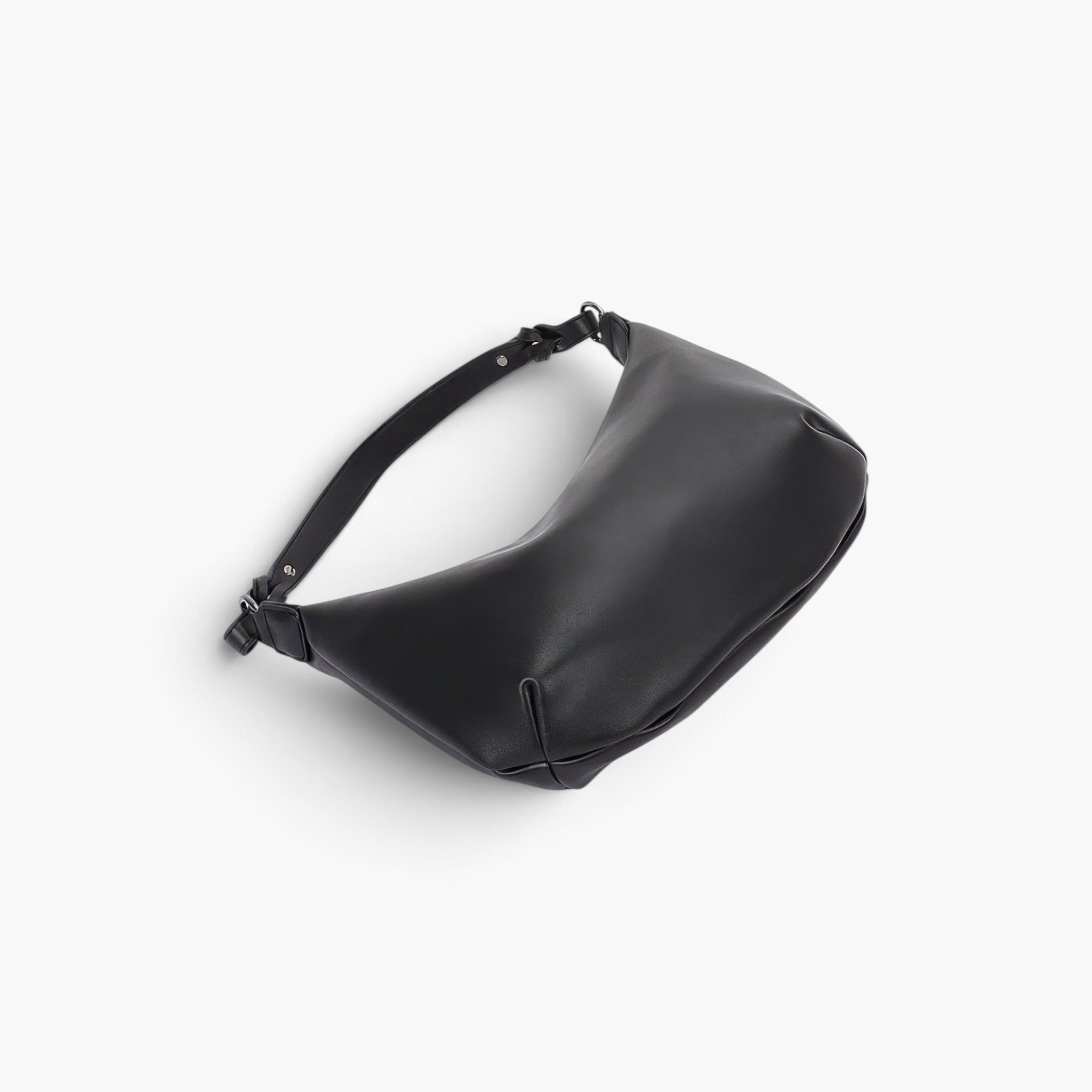 Beach Rose Co. black faux leather shoulder bag with a unique strap design and mixed metal hardware
