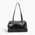 Beach Rose Co. black faux leather sport bag with a secure zipper closure and sleek modern design.