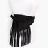 Beach Rose Co. black faux suede fringe belt tied at the waist on a mannequin, featuring long swaying fringe details.