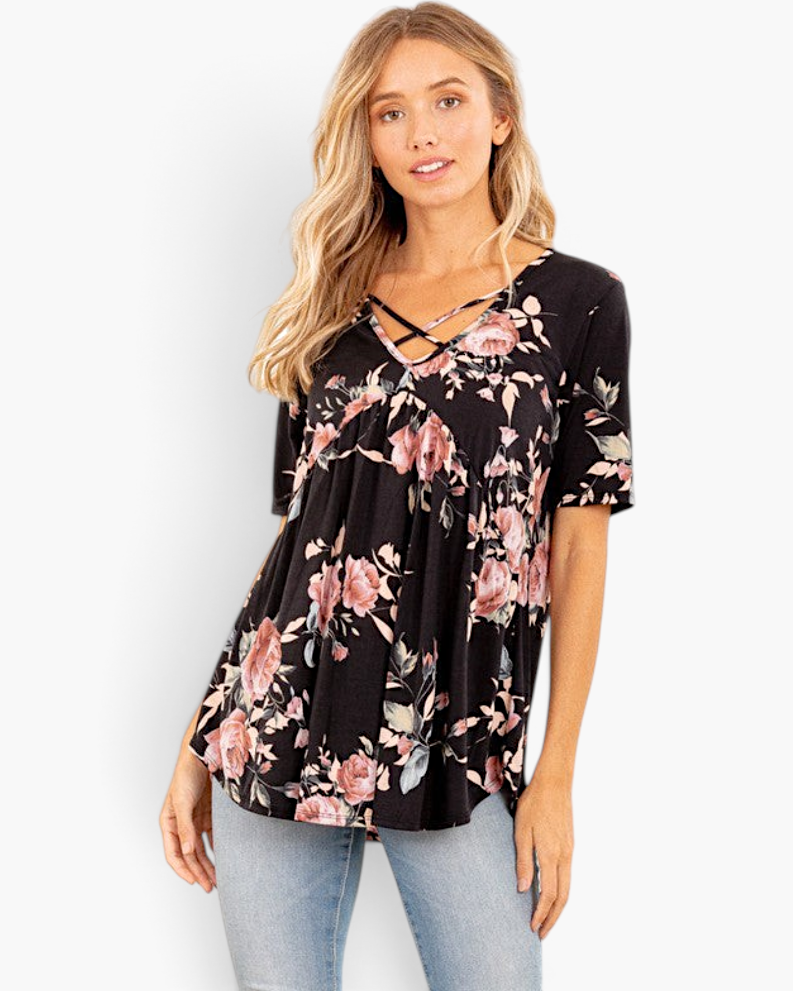 Beach Rose Co. black floral babydoll top with a crisscross V-neckline and short sleeves worn by a blonde model.
