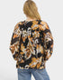 Beach Rose Co. black floral puff sleeve blouse with ivory, tan, and rust leaf print. Rayon/nylon blend.