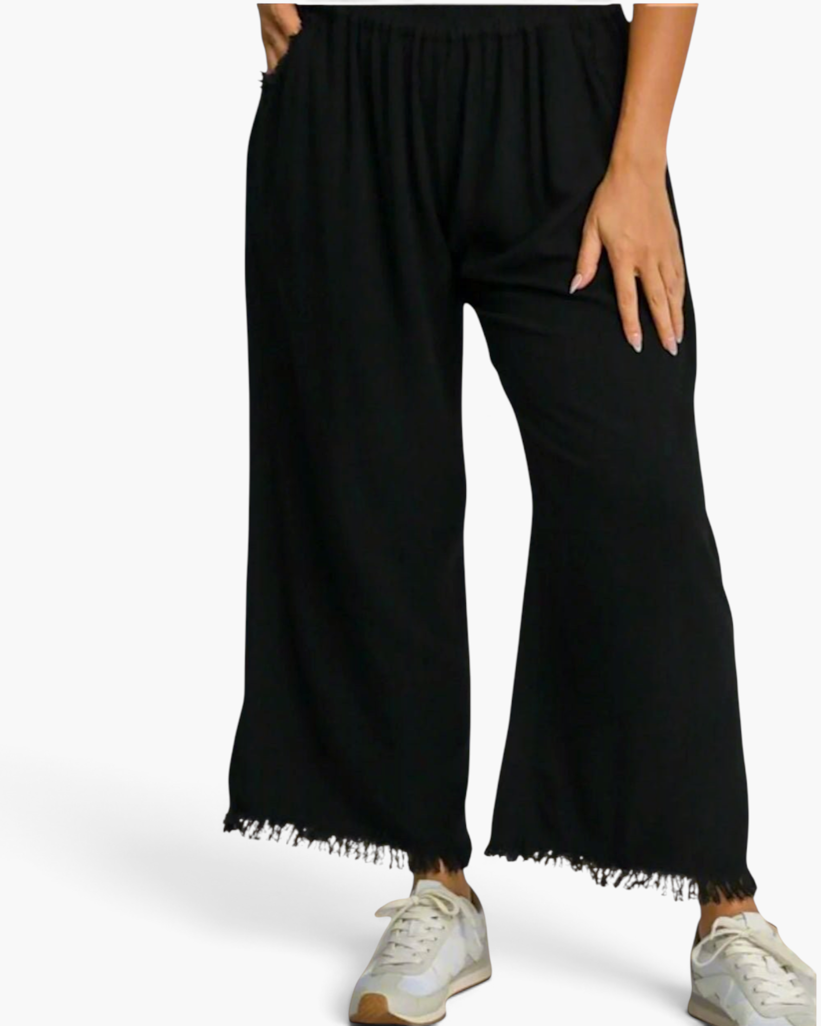Beach Rose Co. black linen-cotton wide-leg pants with an elastic waistband, side pockets, and frayed raw-edge hems.