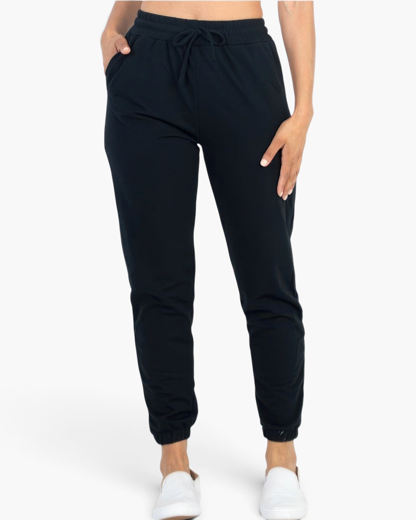Beach Rose Co. black French Terry jogger pants with an elastic waistband, drawstring, and tapered cuffs.