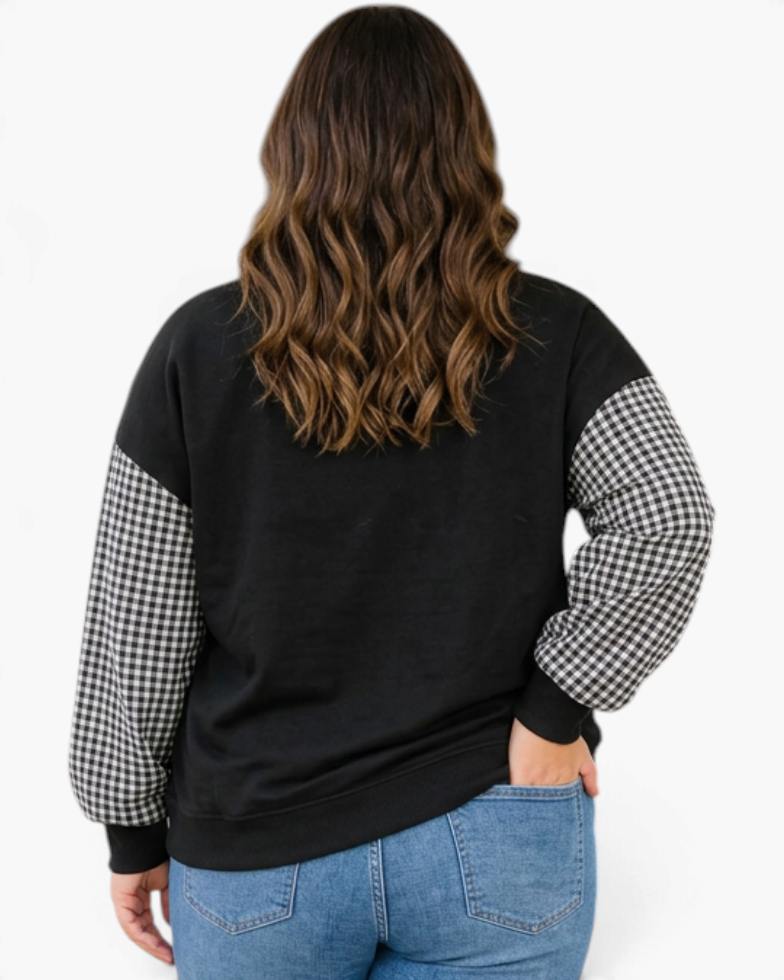 Back view of a Beach Rose Co. plus size black sweatshirt with contrasting gingham sleeves and ribbed hem.