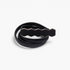 Beach Rose Co. black skinny waist belt featuring a geometric hexagon metal buckle and a finely ribbed stretch band.
