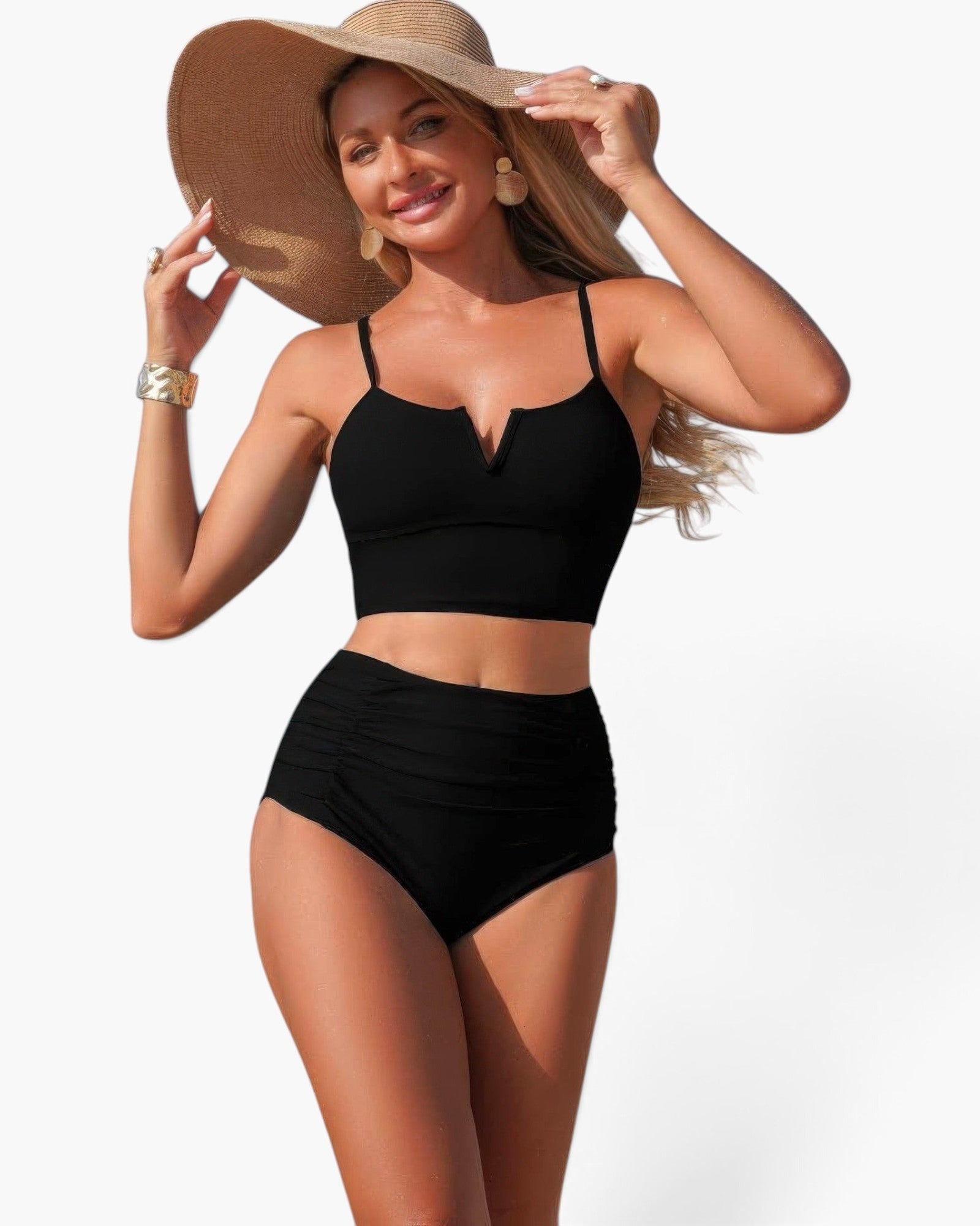 Beach Rose Co. black two-piece bikini with high-waisted pleated bottoms and strap top worn by a model with a sun hat.
