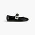 Beach Rose Co. black glossy Mary Jane flats with a square jewel-embellished buckle and rounded toe.