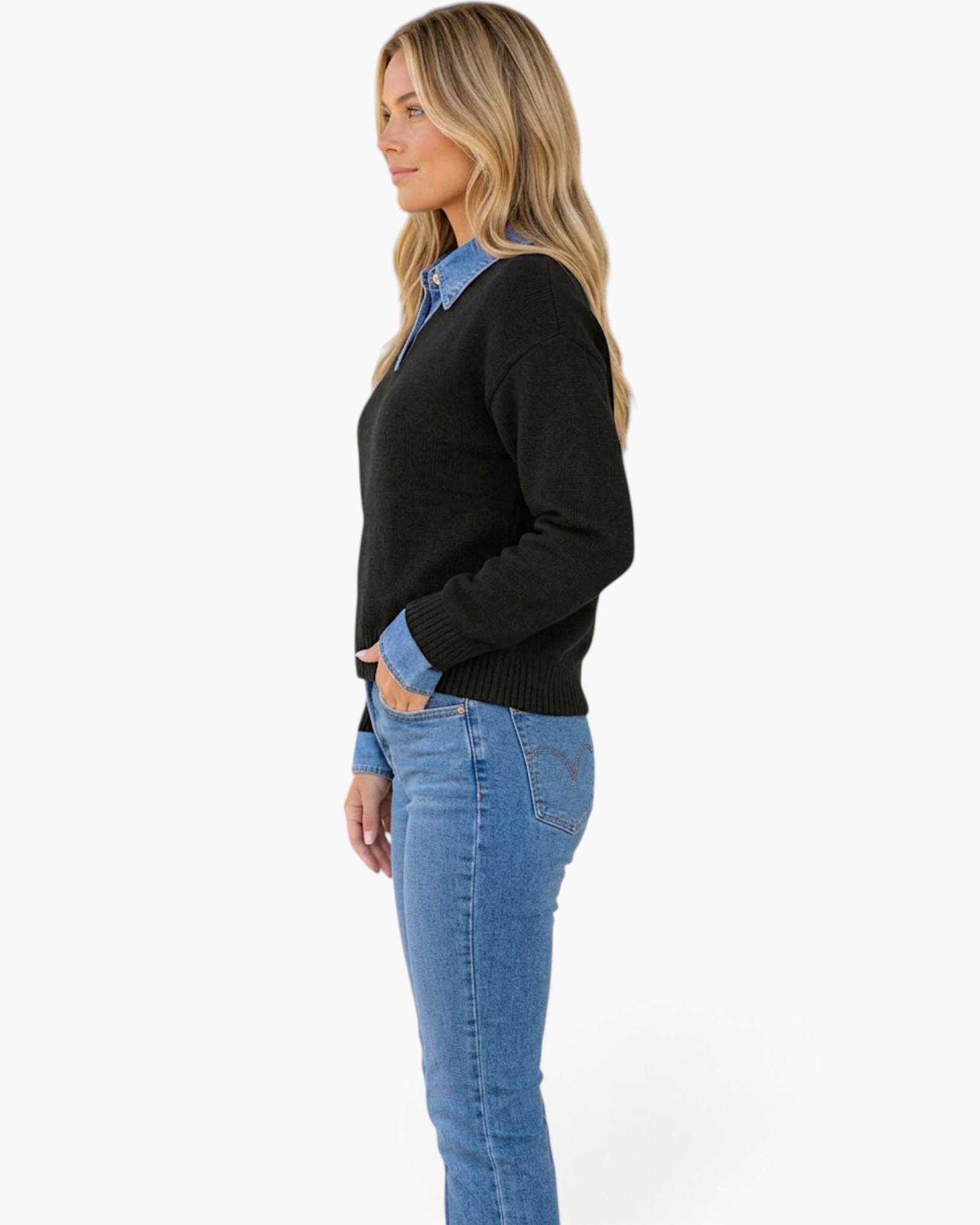 Beach Rose Co. black knit sweater with denim collar and cuffs worn by a blonde model in profile view.