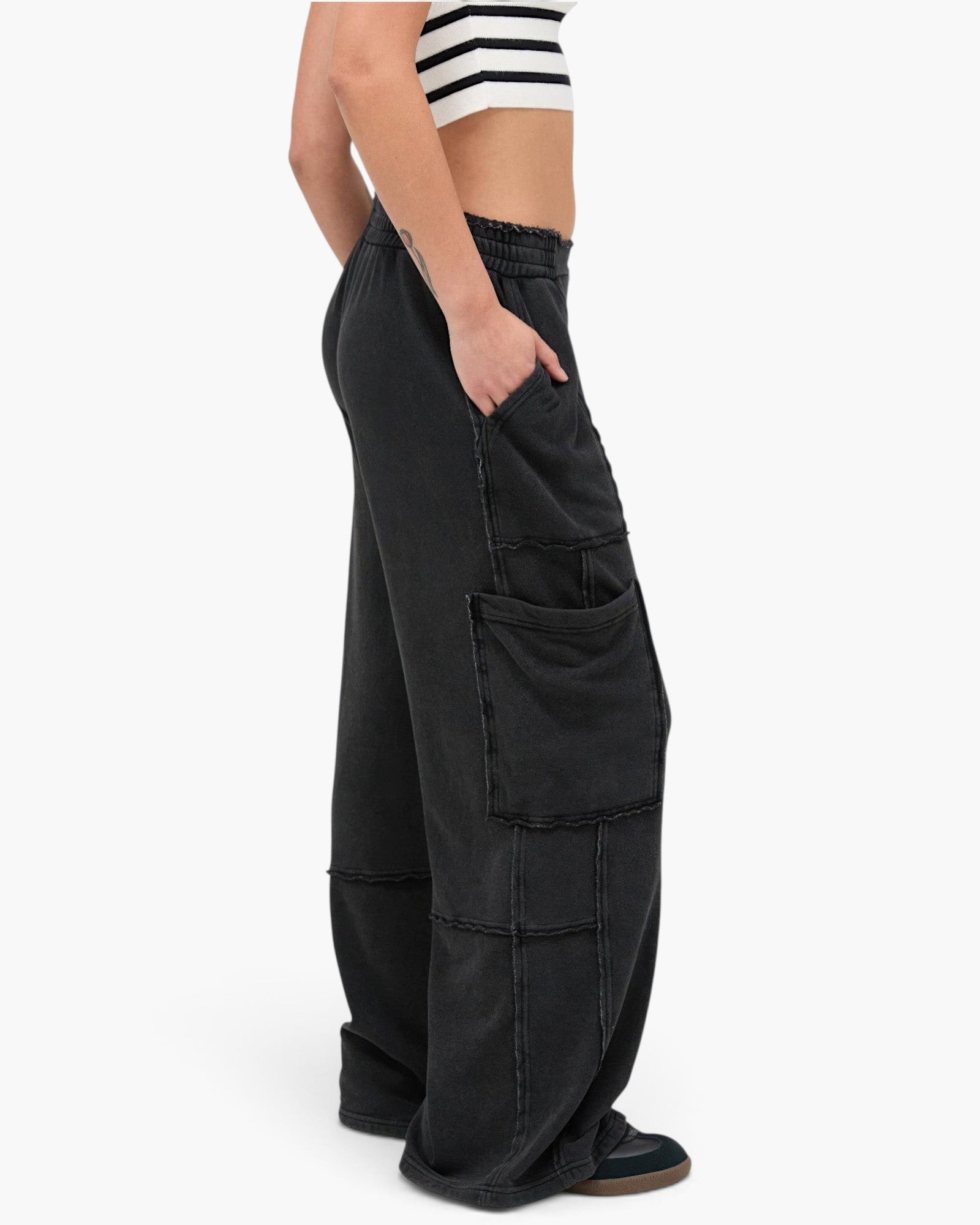 Beach Rose Co. black mineral wash wide leg cargo pants with raw edge patch pockets and high-rise elastic waistband