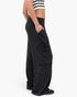 Beach Rose Co. black mineral wash wide leg cargo pants with raw edge patch pockets and high-rise elastic waistband