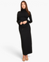 Beach Rose Co. black mock neck crop top with bell sleeves and matching maxi skirt with drawstring waist on a model