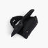 Beach Rose Co. black nylon clutch featuring a decorative bow front and a gathered scrunchie-style top handle.