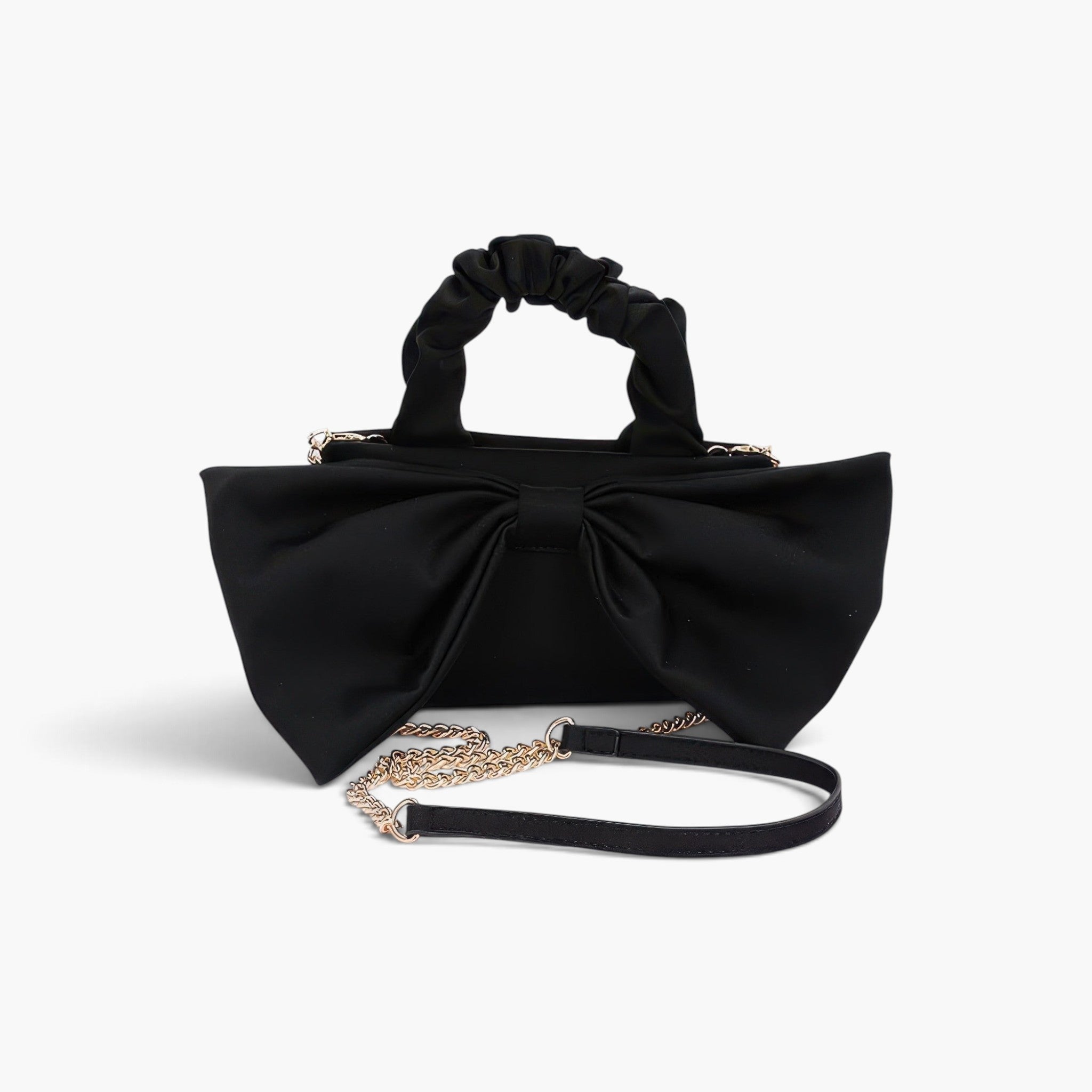 Beach Rose Co. black nylon clutch featuring a large front bow, a ruched top handle, and a detachable gold chain strap.