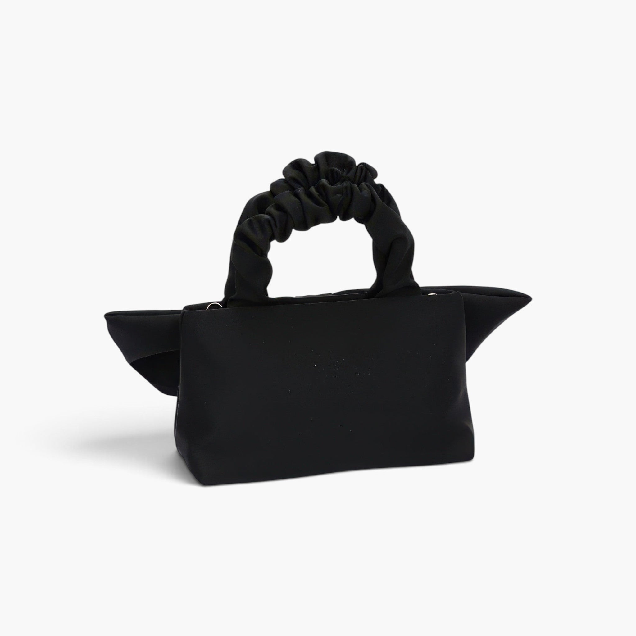 Beach Rose Co. black nylon clutch with a unique bow-inspired front and a gathered scrunchie-style top handle.