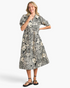 Beach Rose Co. black and ivory cotton midi dress with paisley floral print, collared neck, and puff sleeves.
