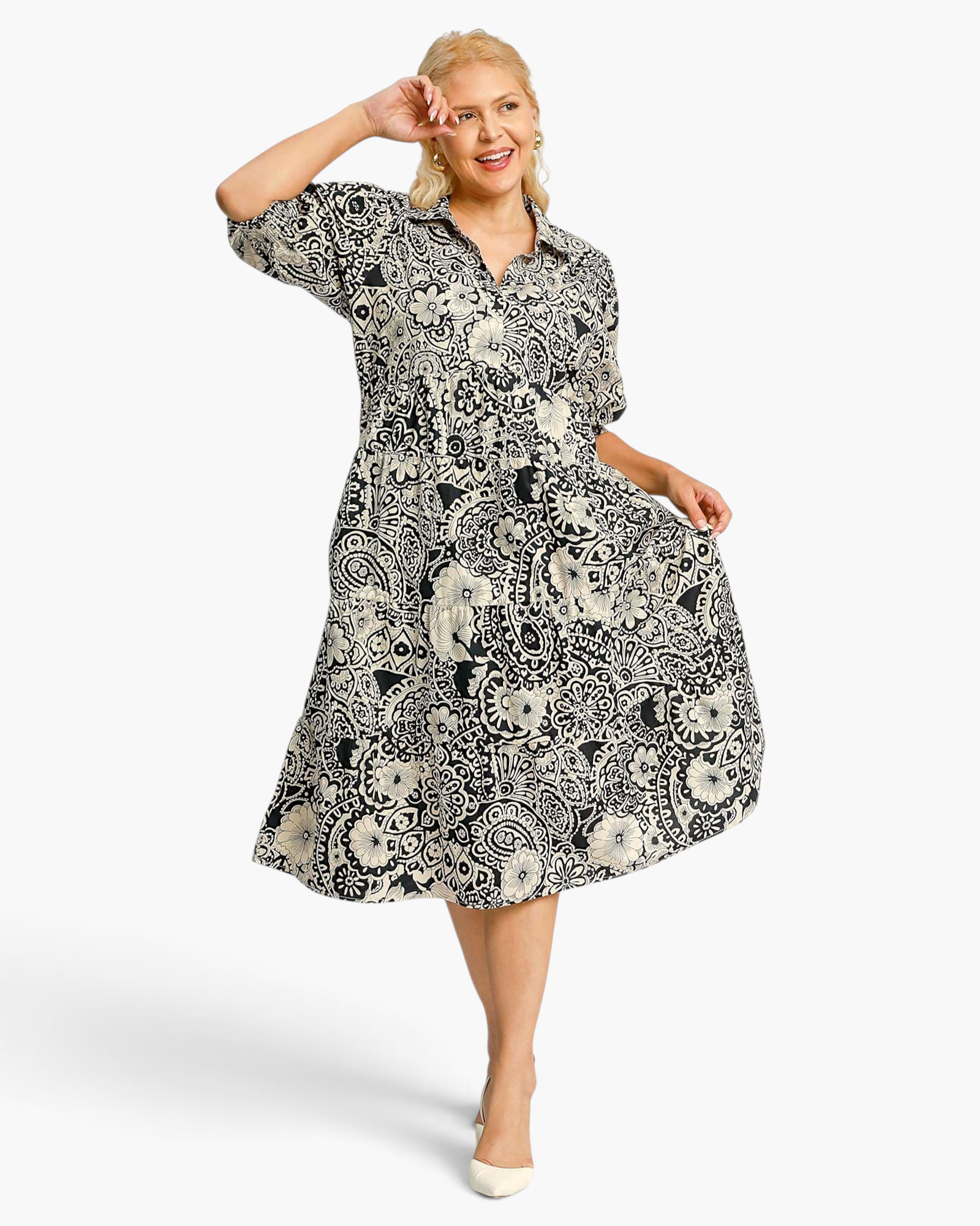 Beach Rose Co. black and ivory cotton midi dress with paisley floral print, collared neckline, and puff sleeves.
