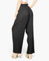 Beach Rose Co. black pleated stretch crepe wide leg pants with a high-waisted pull-on design and tie front detail.