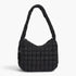 Beach Rose Co. black quilted nylon padded crossbody bag with a soft, textured finish and a comfortable shoulder strap.