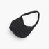 Beach Rose Co. black quilted nylon padded crossbody bag with a soft texture and adjustable strap.