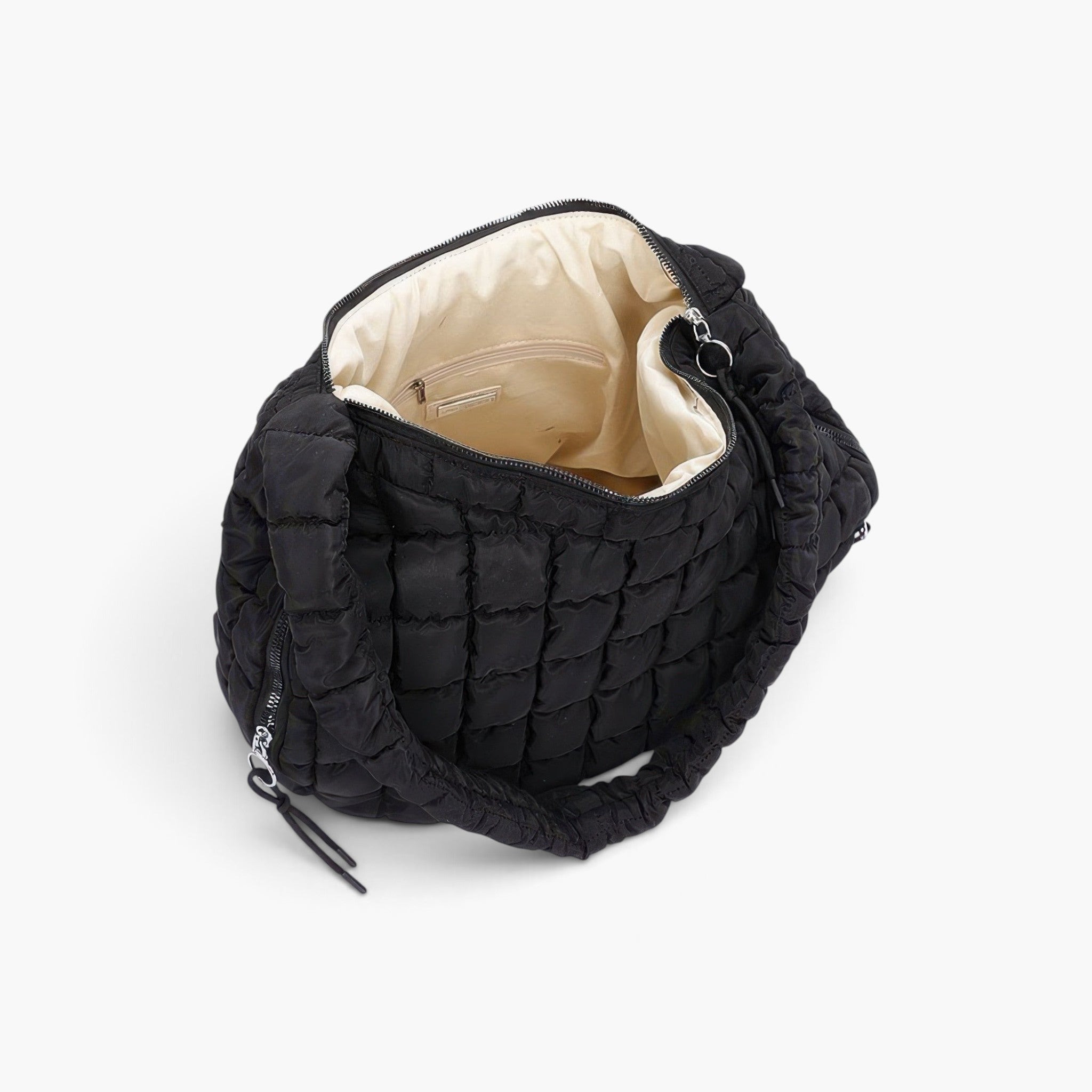 Beach Rose Co. black quilted nylon padded crossbody bag with an open interior and zipper closure