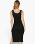 Back view of a Beach Rose Co. black sleeveless ribbed bodycon midi dress with a side slit on a model