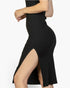 Beach Rose Co. black sleeveless bodycon midi dress in soft ribbed fabric with a stylish side slit, side view