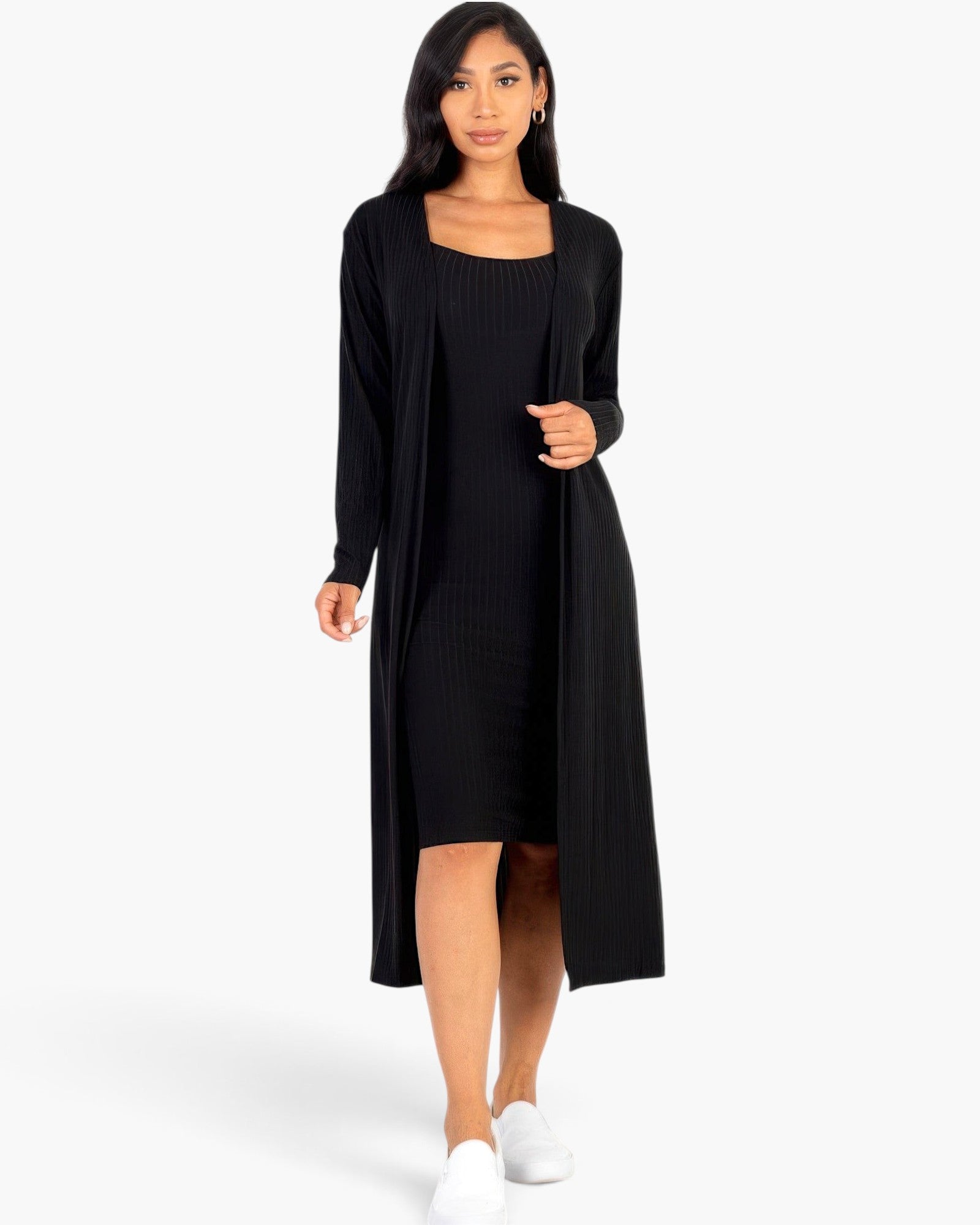 Beach Rose Co. black ribbed midi bodycon dress and matching long cardigan set worn by a model with white sneakers.