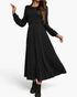 Beach Rose Co. black ribbed knit midi dress with long balloon sleeves, round neckline, and a flared skirt.