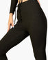 Beach Rose Co. black ribbed lounge leggings with an elastic drawstring tie-front waist on a model