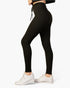 Beach Rose Co. black ribbed lounge leggings with a tie-front drawstring waistband worn by a model in white sneakers.