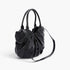 Beach Rose Co. black faux leather tote bag with stylish ruched detailing and sturdy handles on a white background