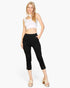 Beach Rose Co. black cropped pants with a slit hem, elastic waist, and stretch crepe fabric worn by a blonde model.