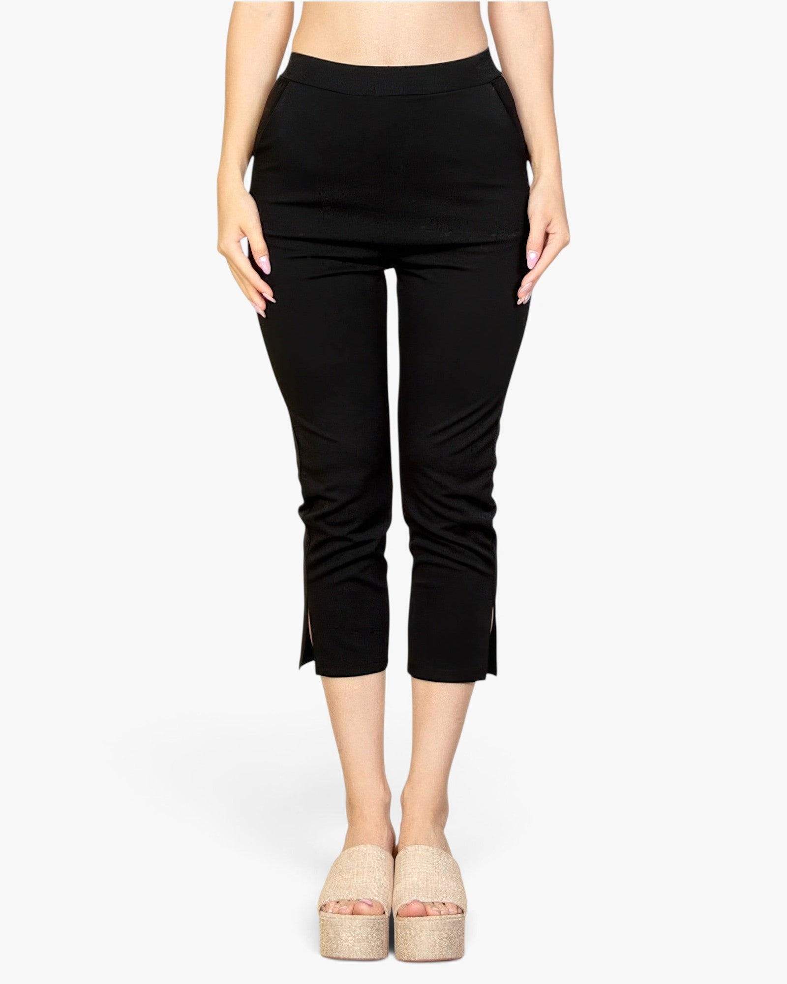Beach Rose Co. black cropped pants in stretch crepe fabric with a slit hem detail and elasticized waist