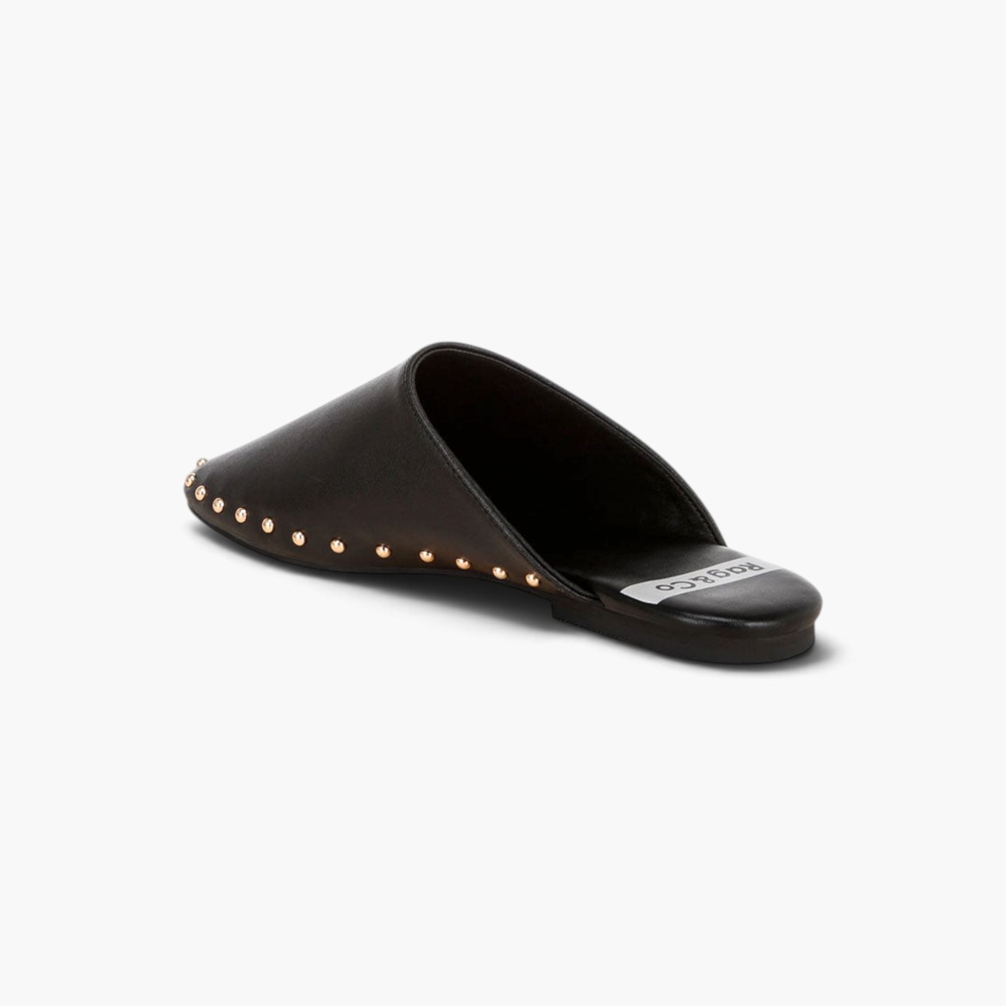 Beach Rose Co. black backless flat mules featuring a round toe and gold studded trim detail.