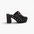 Beach Rose Co. black leather platform clogs with gold studs, buckle detail, and a chunky 3.5-inch block heel.
