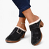 Beach Rose Co. black suede clogs with fluffy white trim, oversized buckle, contrast stitching, and chunky block heel.