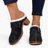 Beach Rose Co. black suede clogs with fluffy white trim, oversized buckle, contrast stitching, and chunky block heel.