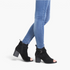 Beach Rose Co. black suede peep-toe ankle boots with buckle straps and stacked heels worn with blue skinny jeans