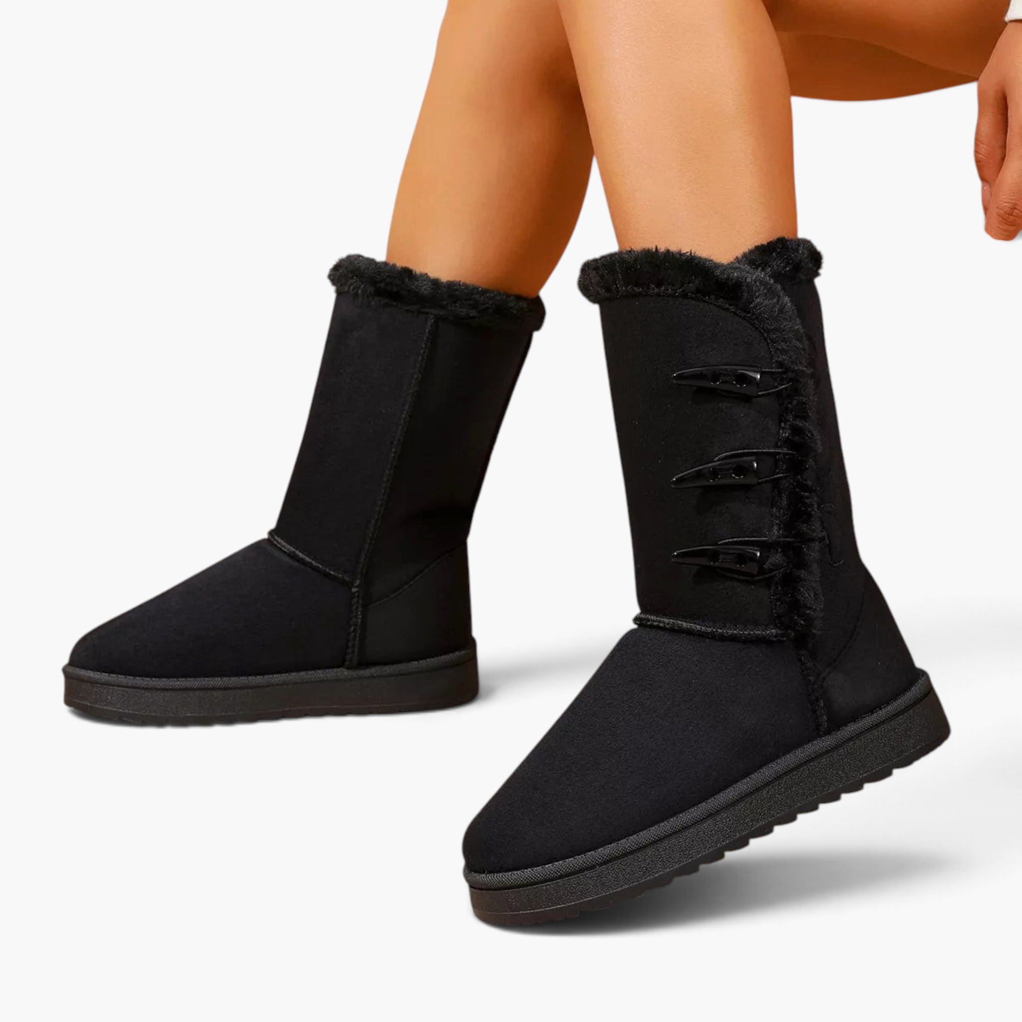 Beach Rose Co. black suede mid-calf boots with faux fur trim and three side toggle fastenings on a low rubber sole.