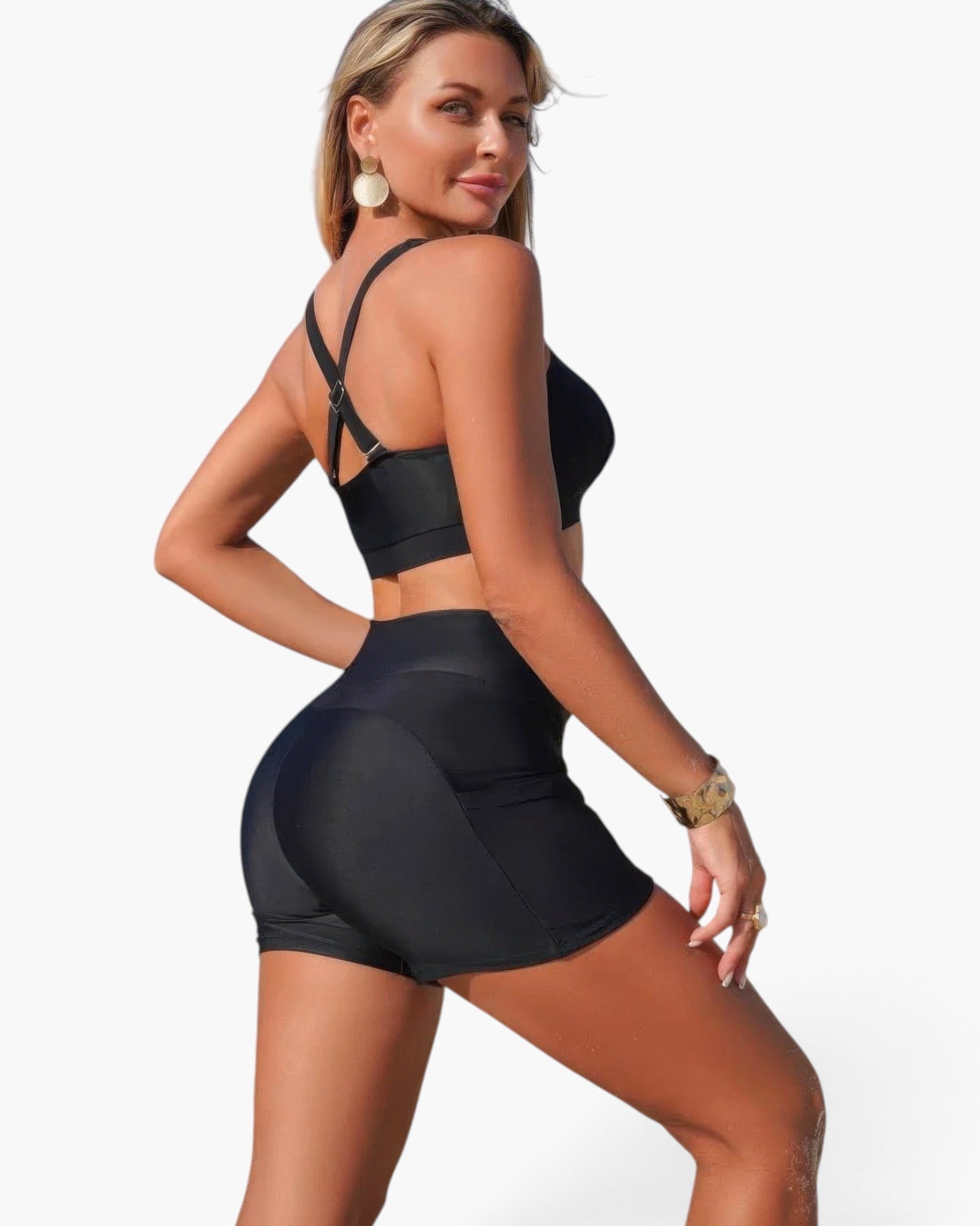 Beach Rose Co. black two-piece bikini with tummy control shorts and crisscross back straps on a model.