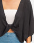 Beach Rose Co. black oversized rayon-blend top featuring a front twist knot detail and deep V-neckline