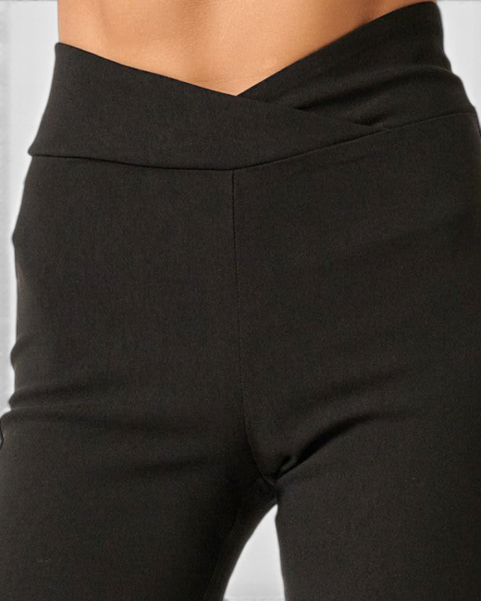 Beach Rose Co. black high-rise flare pants featuring a flattering crossover V-waistband in soft stretch fabric.