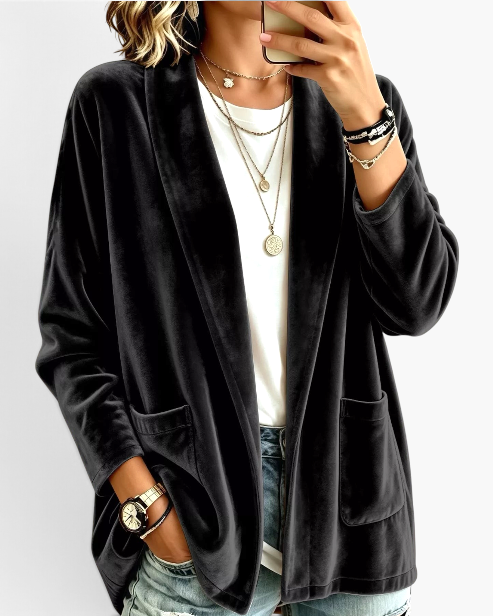 Beach Rose Co. black velour open-front cardigan with patch pockets and relaxed fit worn over a white t-shirt
