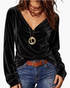 Beach Rose Co. black velvet long sleeve V-neck top with a draped silhouette worn with blue jeans and layered necklaces