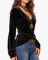 Beach Rose Co. black velvet long sleeve V-neck top with a soft sheen, worn with blue jeans and layered necklaces.